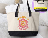 "Live Life In Full Bloom" design on a natural canvas zippered tote bag
