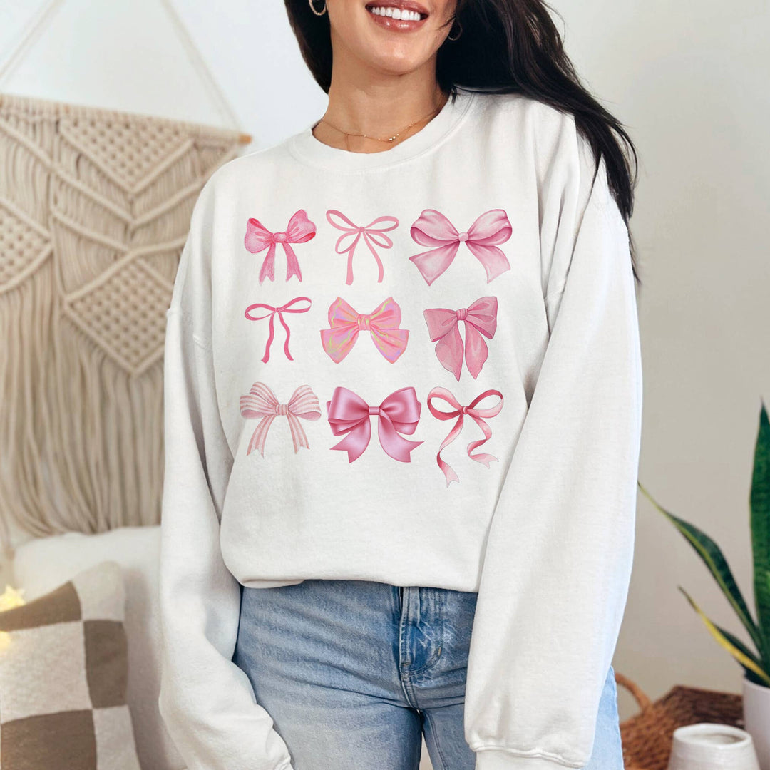 "Coquette Pink Bow" design on a white unisex crewneck sweatshirt