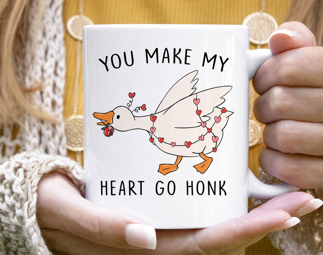 "You Make My Heart Go Honk" design on a white ceramic coffee mug