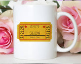 "One Ticket To The Sh*T Show" design on a white ceramic coffee mug