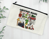 "Christmas Movies Collage Buddy & Clark" design on a natural canvas zipper makeup bag