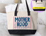 "Motherhood Some Days I Rock It" design on a natural canvas zippered tote bag