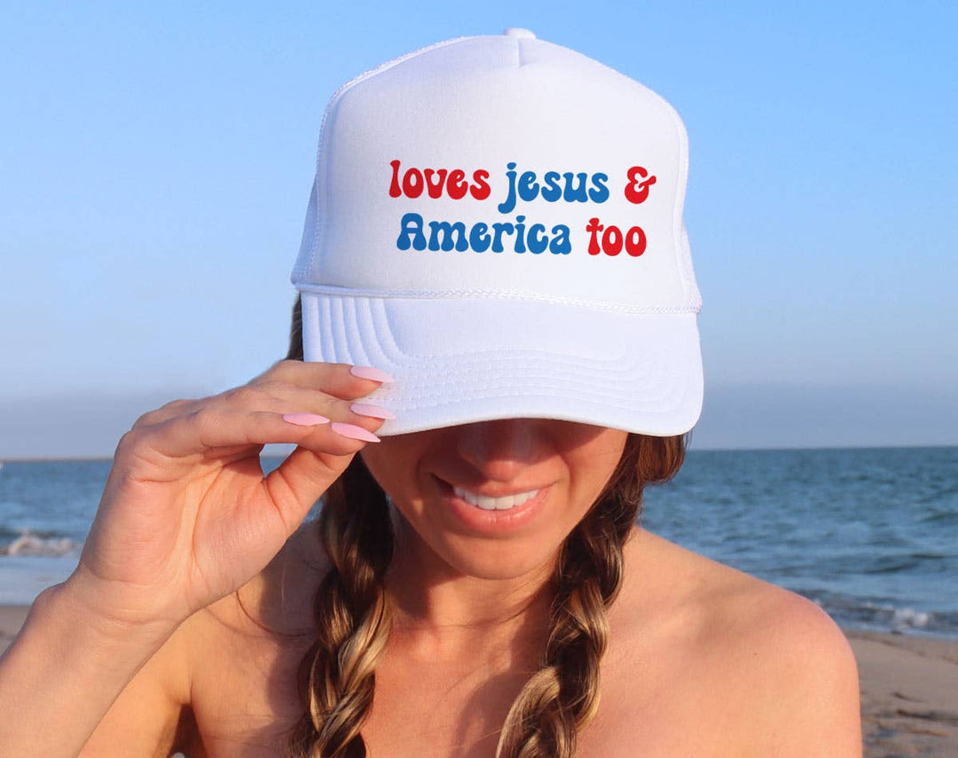 "Loves Jesus And America Too" design on a mesh-back snapback trucker hat