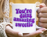 "You're Doing Amazing Sweetie" design on a white ceramic coffee mug
