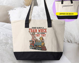 "I'm Not Always A Train Wreck Funny Retro Train" design on a natural canvas zippered tote bag