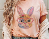 "Easter Bunny Heart Glasses Patchwork" design on a peach unisex t-shirt