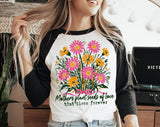 "Mothers Plant Seeds Of Love" design on a white baseball raglan tee with black sleeves