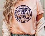 "Human Rights Are Not Political" design on a peach unisex t-shirt