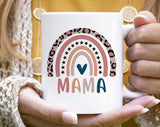 "Mama Rainbow" design on a white ceramic coffee mug