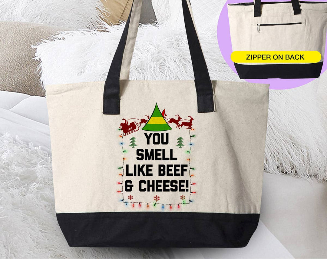 "Smell Like Beef & Cheese" design on a natural canvas zippered tote bag