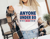 "Anyone Under 80" design on a white unisex t-shirt