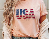 "USA Faux Patchwork American Flag" design on a peach unisex t-shirt