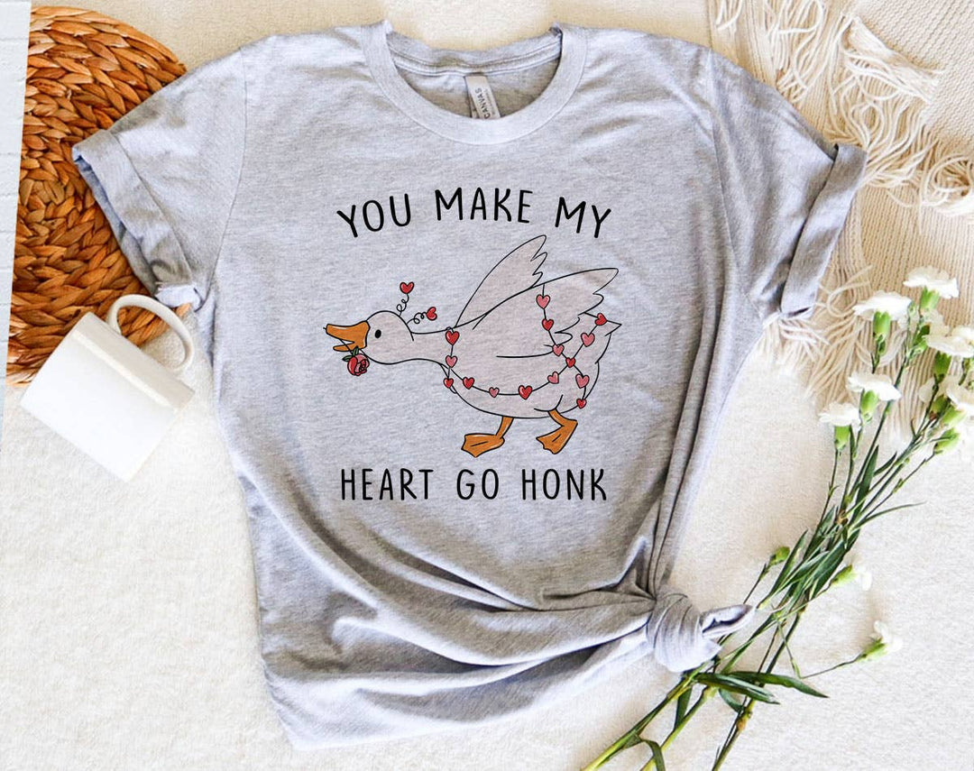"You Make My Heart Go Honk" design on a unisex t-shirt