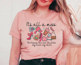 "It's All A Mess Mom" design on a peach unisex t-shirt