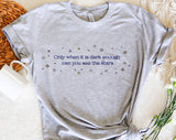 "Only When It's Dark Enough Can You See The Stars" design on a heather gray unisex t-shirt