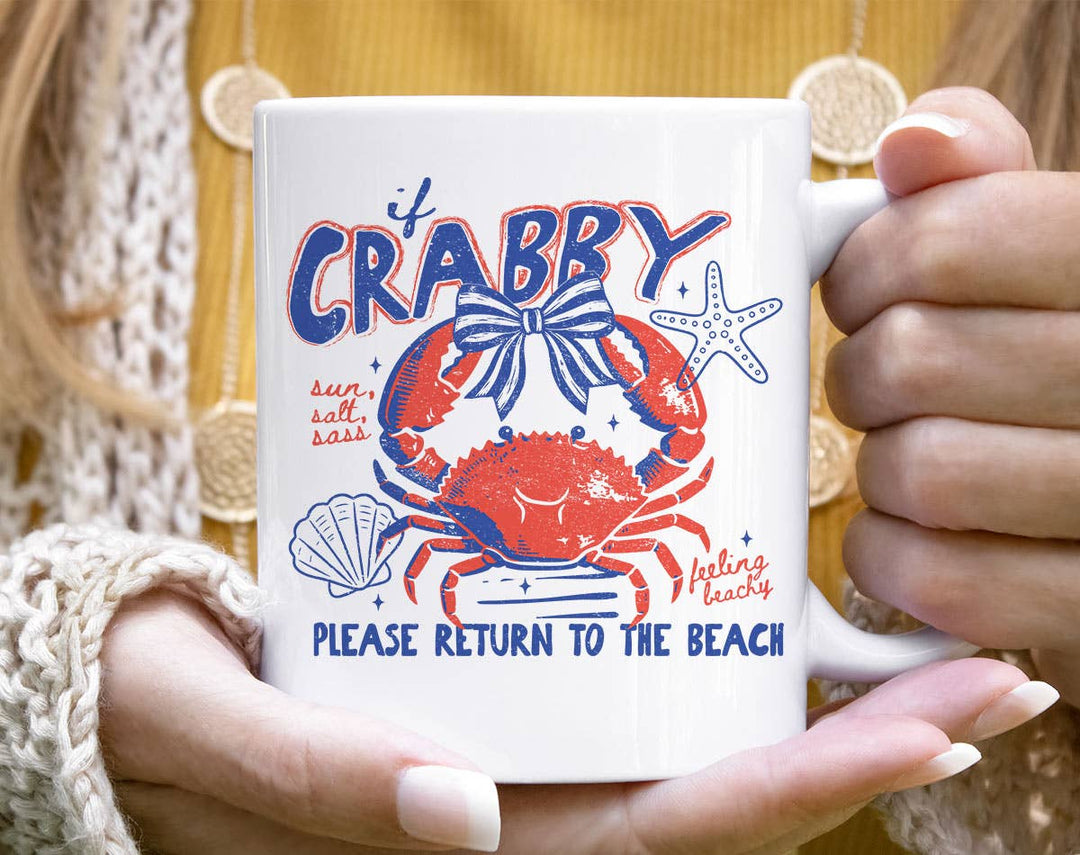 "If Crabby Please Return To The Beach Sun Sand" design on a white ceramic coffee mug