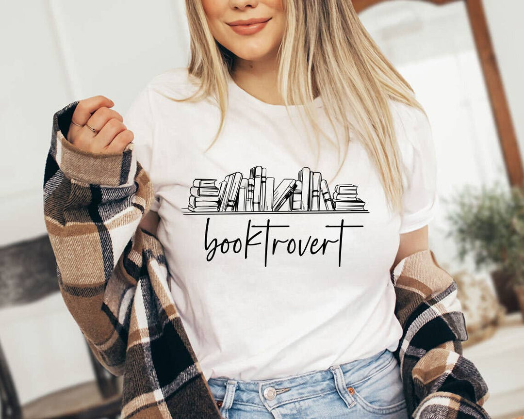 "Booktrovert Bookshelf" design on a white unisex t-shirt