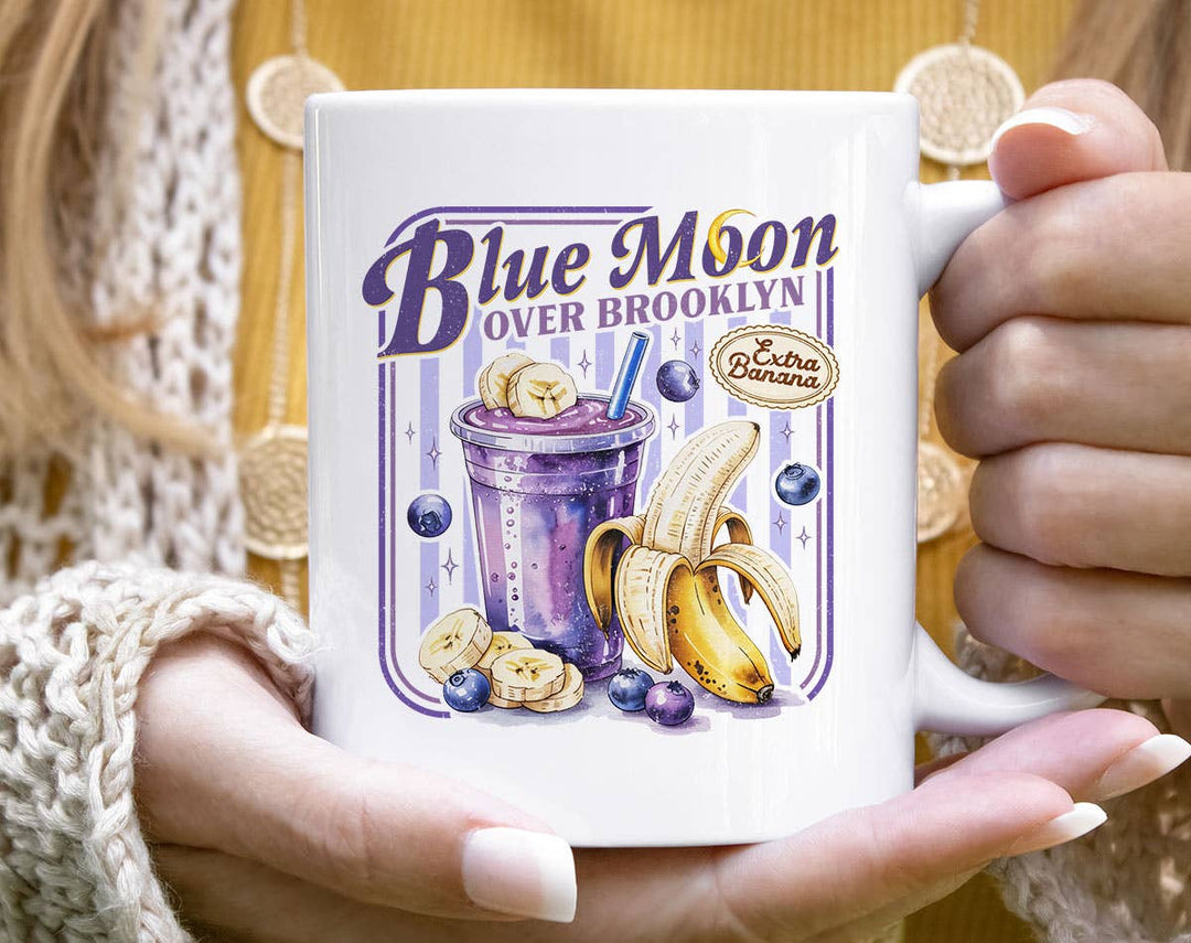 "Blue Moon Over Brooklyn Heated Rivalry Inspired" design on a white ceramic coffee mug