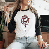 "You'll Float Too" design on a white baseball raglan tee with black sleeves