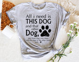 "All I Need Is This Dog And That Dog" design on a heather gray unisex t-shirt