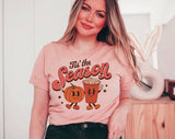 "Tis The Season Pumpkin Spice Latte" design on a peach unisex t-shirt