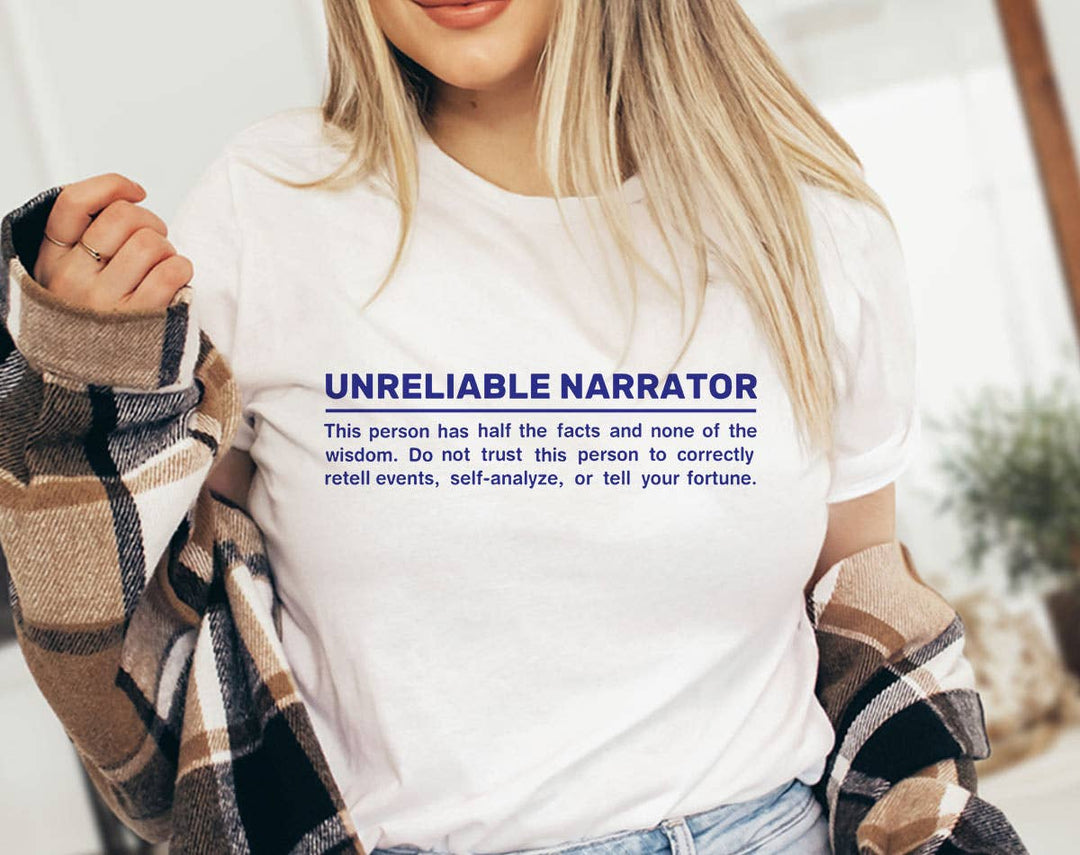 "Unreliable Narrator" design on a white unisex t-shirt