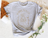"Suriel Tea Co" design on a heather gray unisex t-shirt