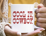 "Cool It Cowboy" design on a white ceramic coffee mug