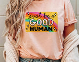 "Just Be A Good Human" design on a peach unisex t-shirt