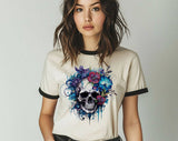"Floral Blue Skull" design on a natural ringer t-shirt with black contrast trim