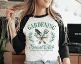 "Gardening Social Club" design on a white baseball raglan tee with black sleeves
