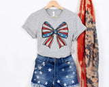"Coquette Bow American Flag" design on a heather gray unisex t-shirt