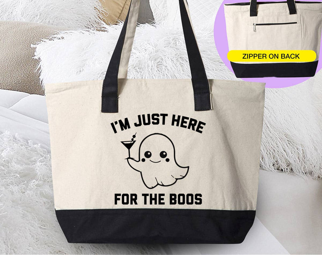 "Just Here For The Boos" design on a natural canvas zippered tote bag