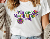 "In My Mardi Gras Era" design on a white unisex t-shirt
