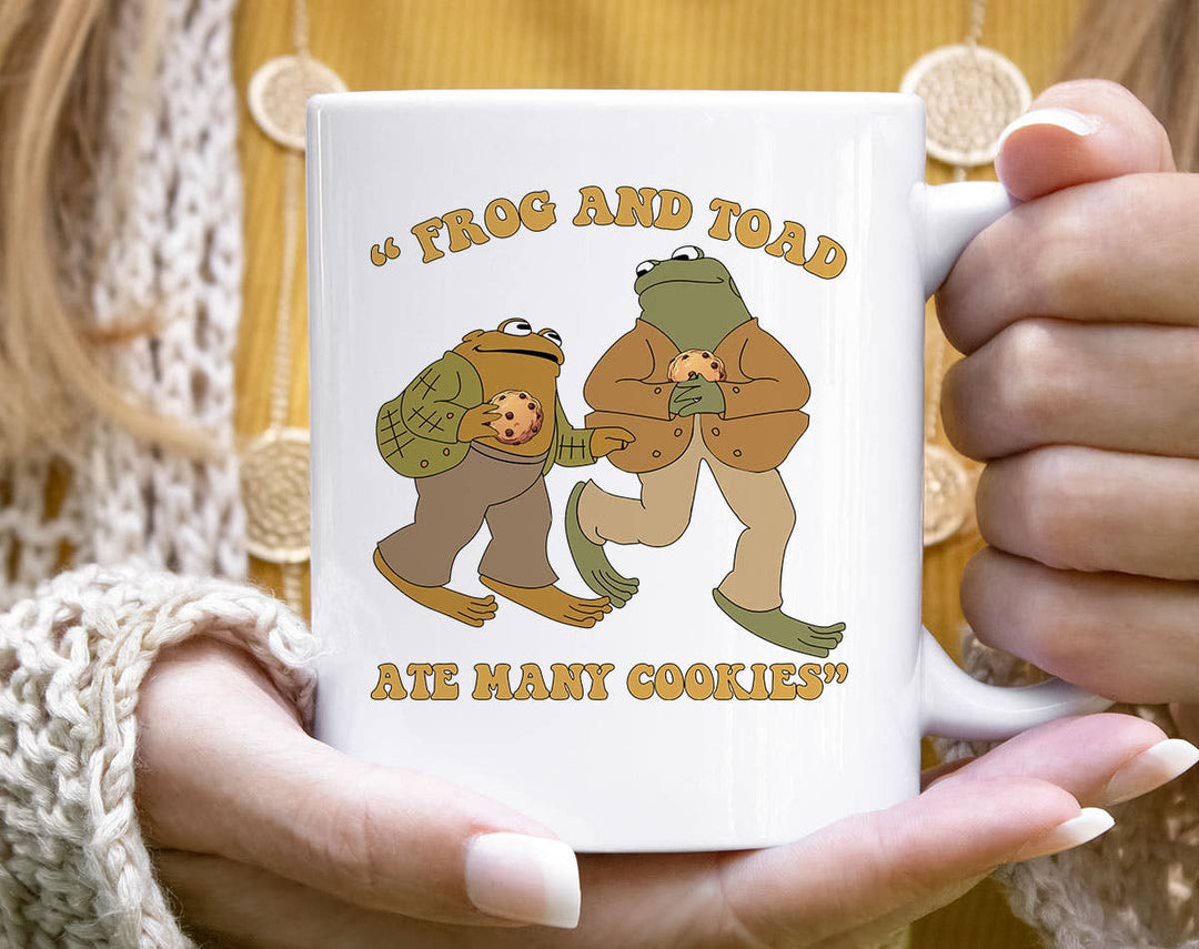 "Frog & Toad Ate Cookies" design on a white ceramic coffee mug