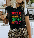 "I'm Just Here For The Chips" design on a black unisex t-shirt