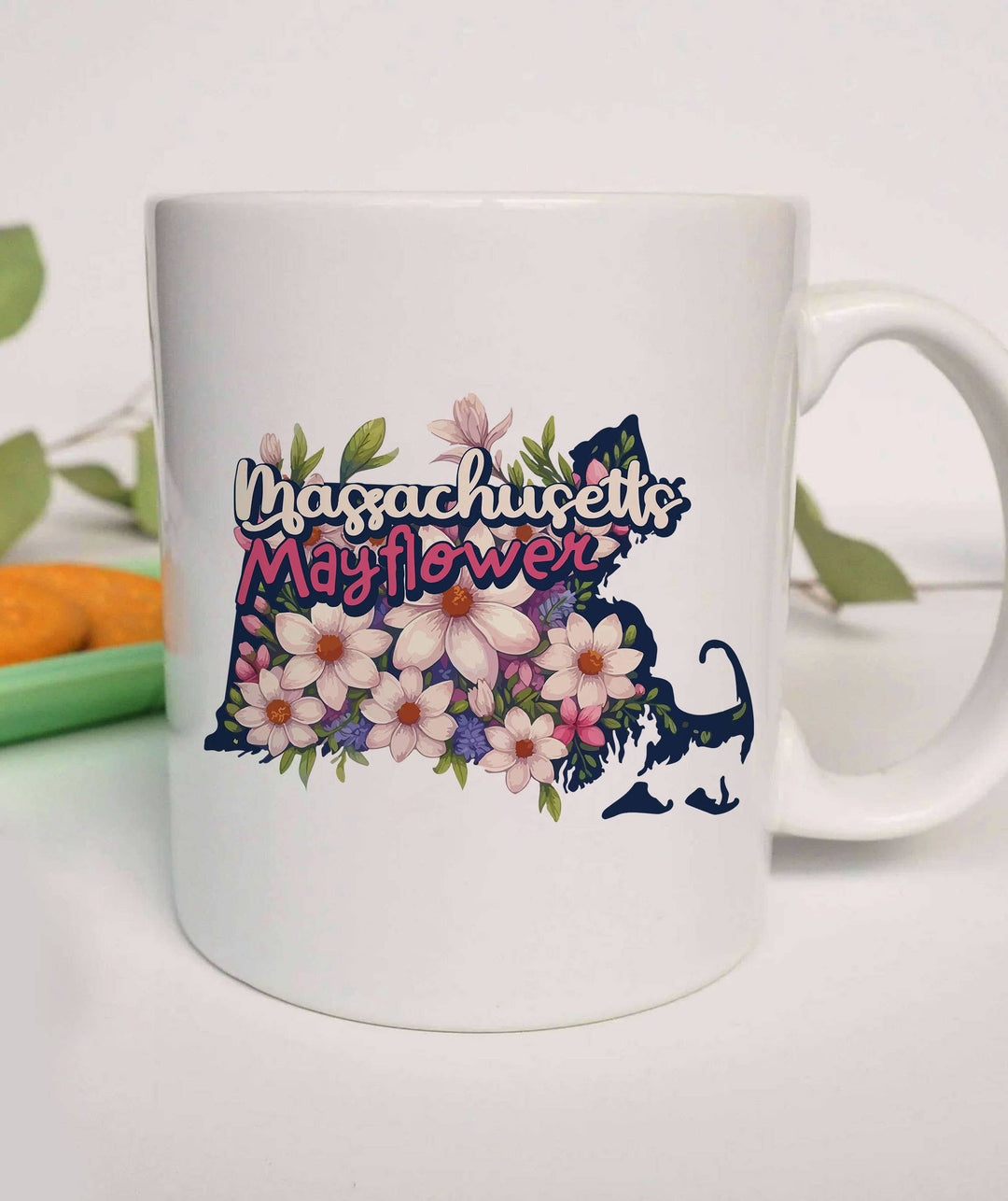 "Massachusetts State Flower Mayflower" design on a white ceramic coffee mug