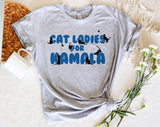 "Cat Ladies For Kamala" design on a heather gray unisex t-shirt