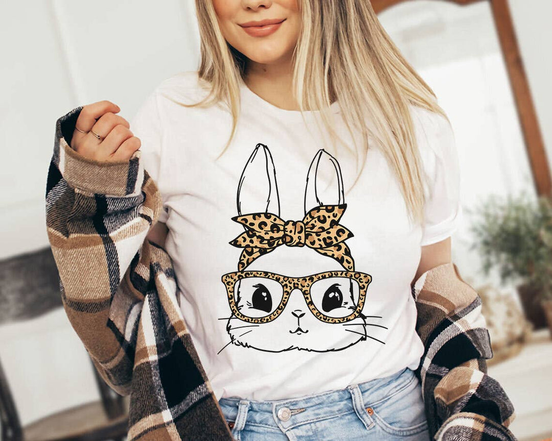"Easter Bunny Leopard Glasses" design on a peach unisex t-shirt
