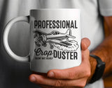 "Professional Crop Duster" design on a white ceramic coffee mug