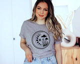 "Magic Mushroom" design on a heather gray unisex t-shirt