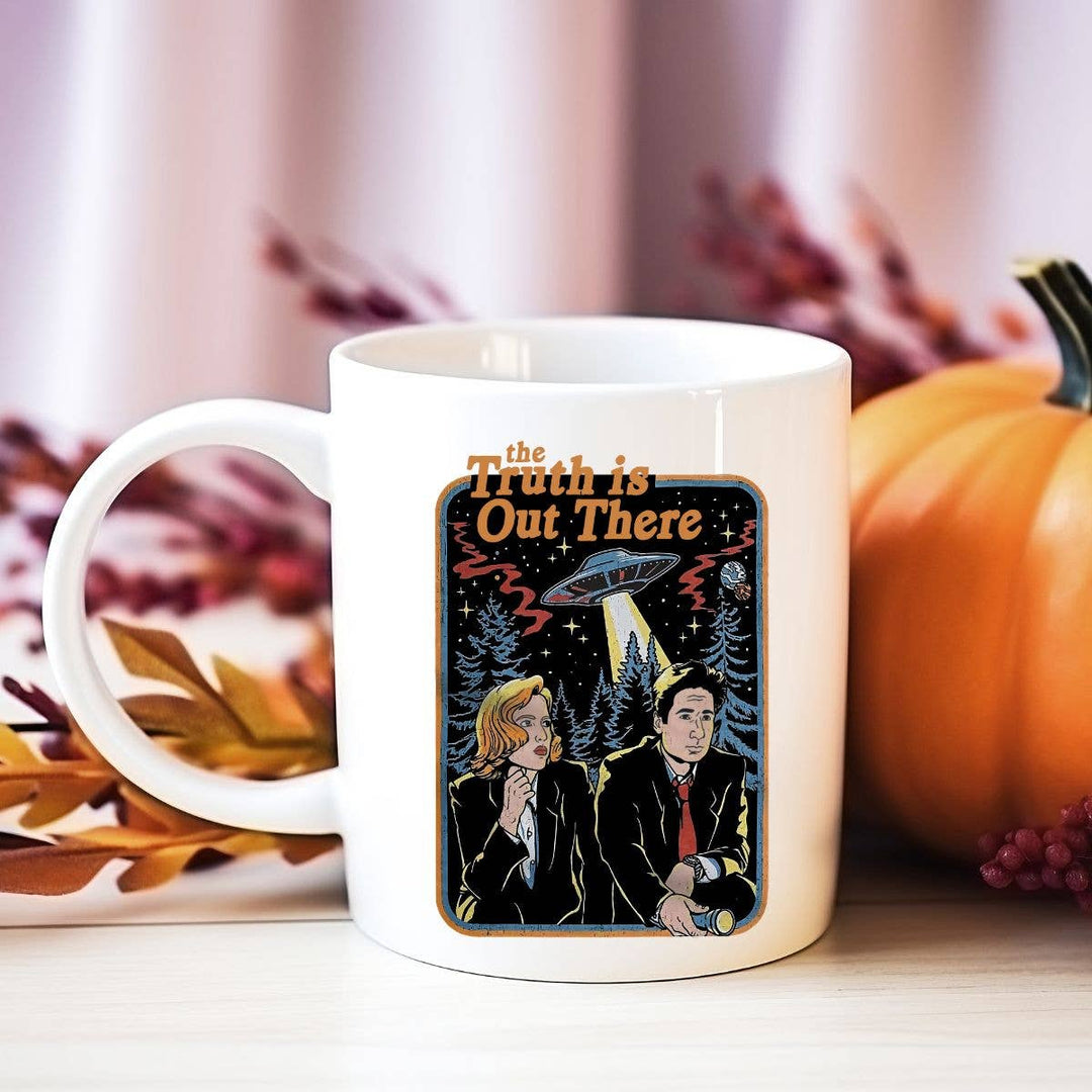 "The Truth is Out There" Halloween design on a white coffee mug