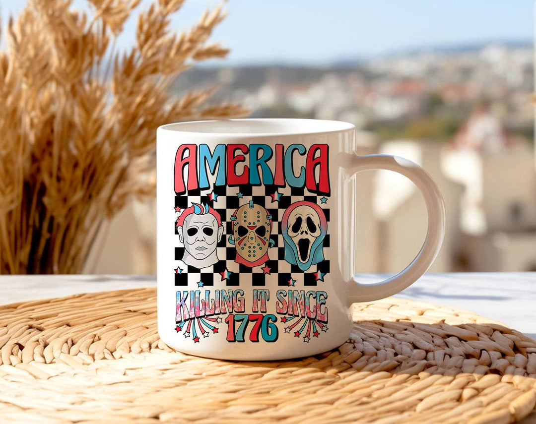 "America Killing It 1776" design on a white ceramic coffee mug