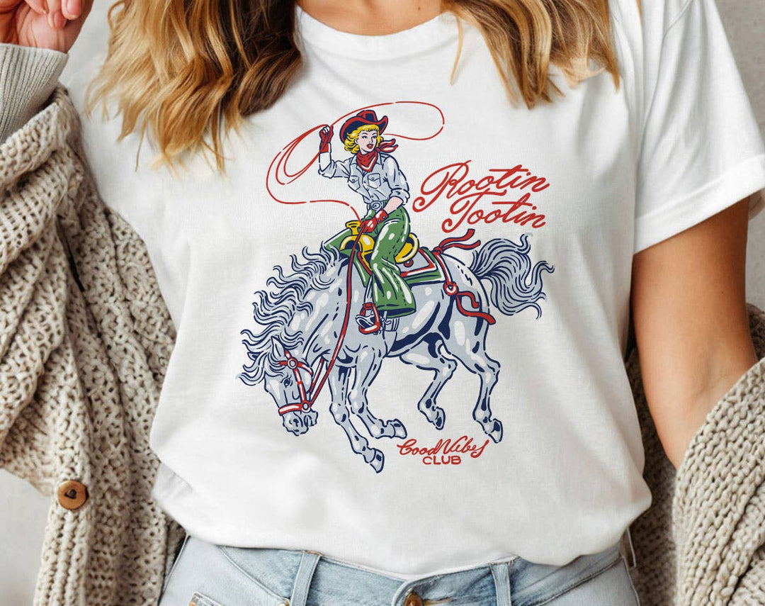 "Rootin' Tootin' Cowgirl" design on a white unisex t-shirt
