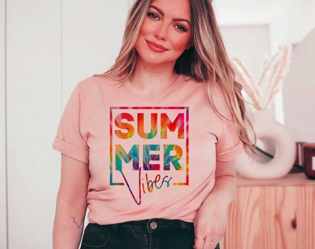 "Summer Vibes Tie Dye" design on a peach unisex t-shirt