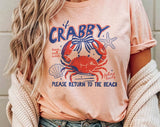 "If Crabby Please Return To The Beach" design on a peach unisex t-shirt