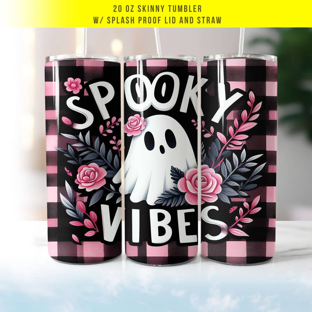 "Spooky Vibes Ghost" design on a 20 oz skinny tumbler with lid and straw