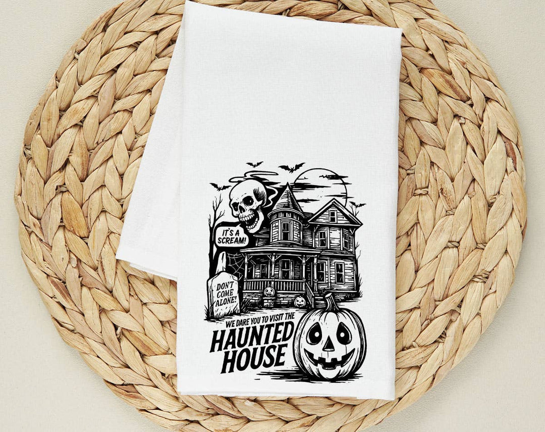 "Haunted House We Dare You" design on a white 28 x 28 inch flour sack tea towel