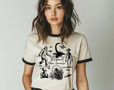 "Respect The Locals Mothman Bigfoot UFO" design on a natural ringer t-shirt with black contrast trim