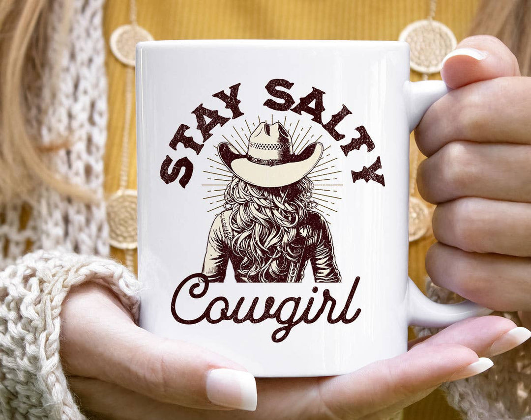 "Stay Salty Cowgirl" design on a white ceramic coffee mug